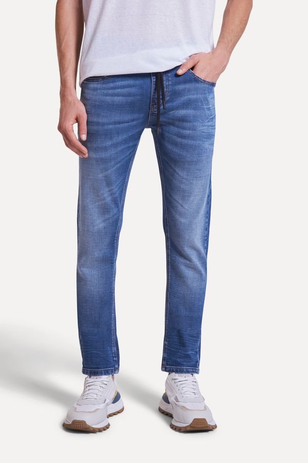 CALCA JEANS SKINNY MOLETOM STING